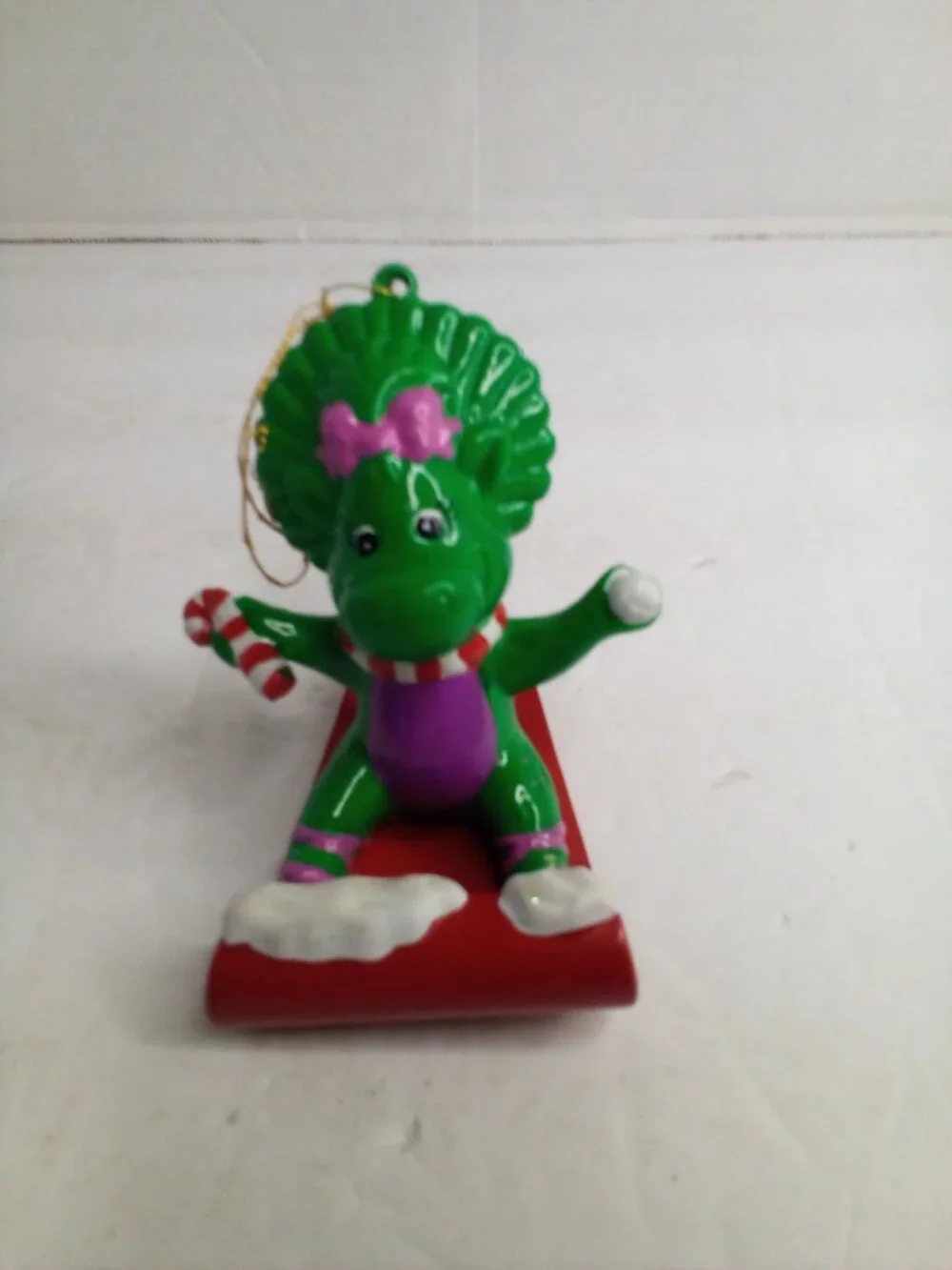 Baby Bop Sledding Christmas Ornament Plastic Barney 2000 Lyons Partnership